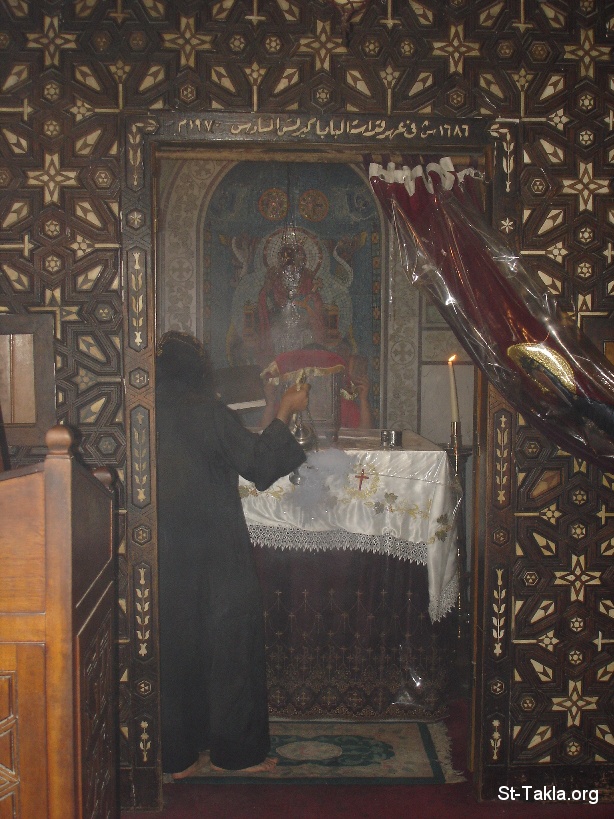 St-Takla.org Image: A Coptic Orthodox Priest Monk raising incense in a Church at St. Mina Monastery Marriott Egypt     :                ء 